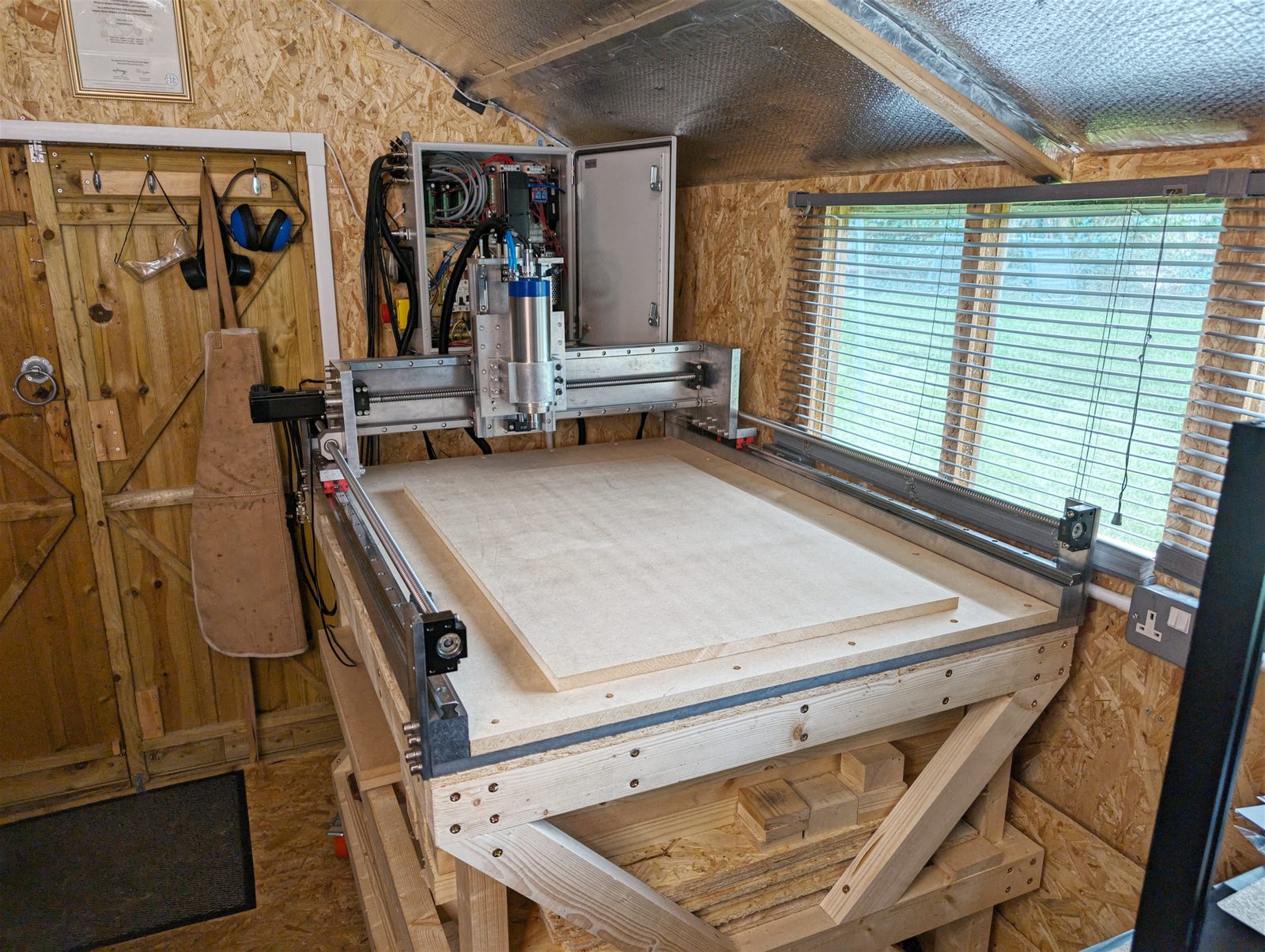 The finished open-source CNC mill in a timber workshop